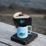 Pour-over brewing on the MiiR digital coffee scale by the water