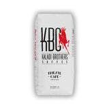 Trieste Cafe blend 1lb bag — white Kaladi Brothers Coffee bag with red goat logo
