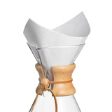 White Chemex pre-folded square filter in glass brewer