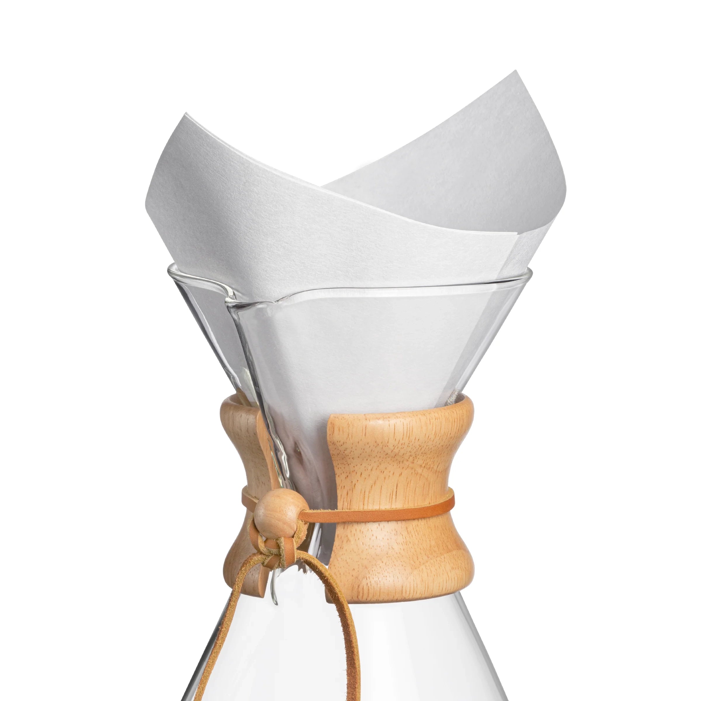 White Chemex pre-folded square filter in glass brewer