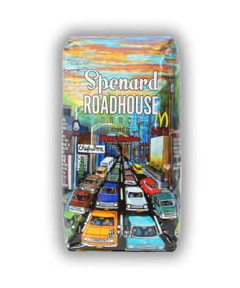 Kaladi Brothers Coffee A bag of Spenard Roadhouse Blend coffee with a picture of cars on it.